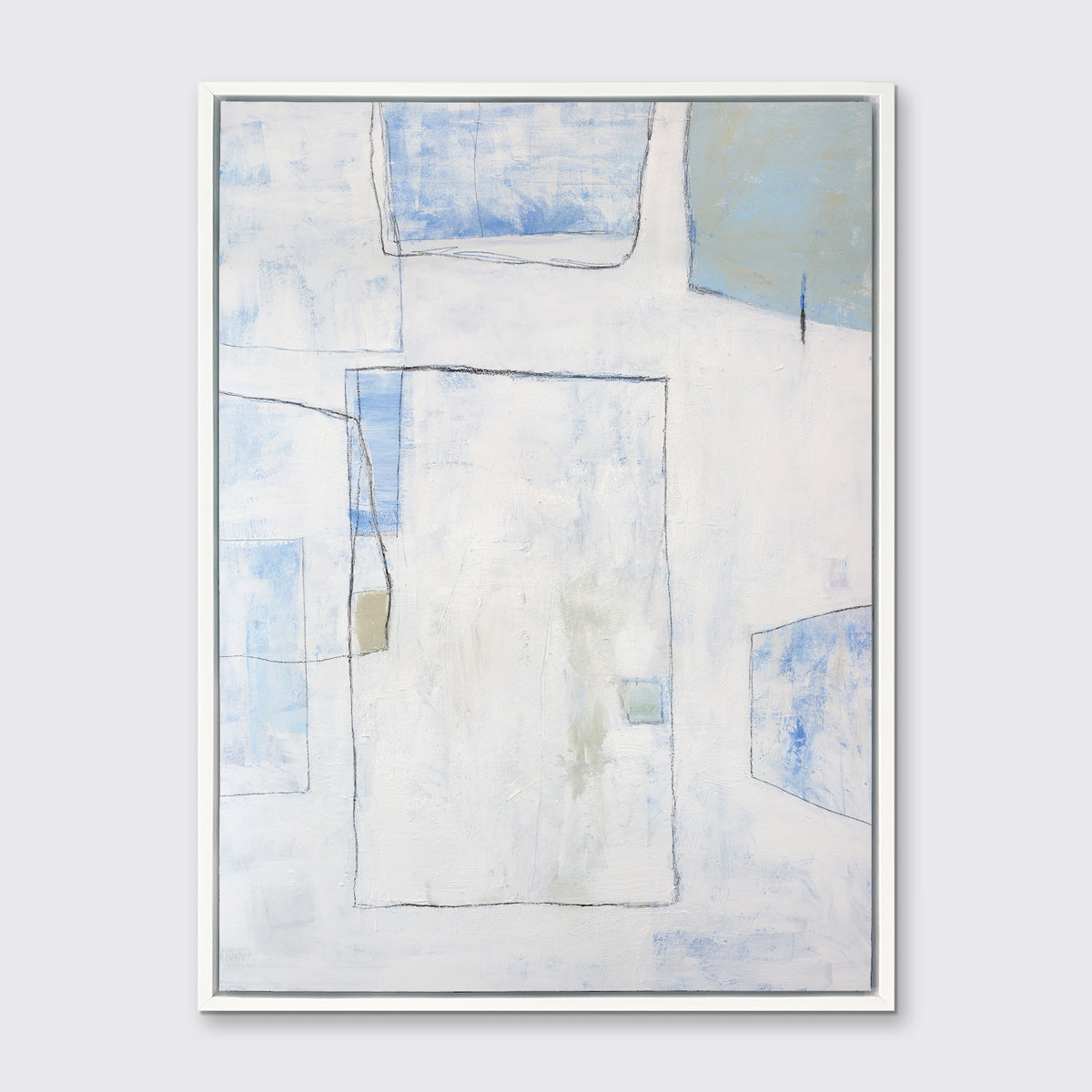 A white, blue and green abstract print in a white floater frame hangs on a white wall.