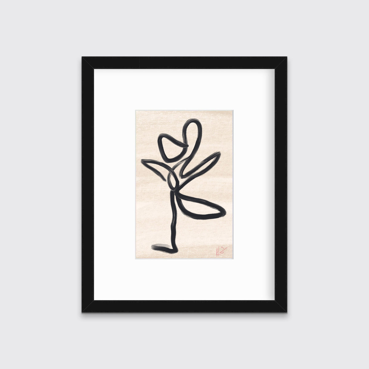 A black and beige abstract print by Hazal Ozturk framed in a black frame hangs on a light grey wall.