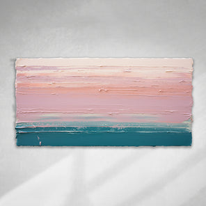 A peach, orange, coral, pale pink and teal thickly textured abstract painting hangs on a white wall.