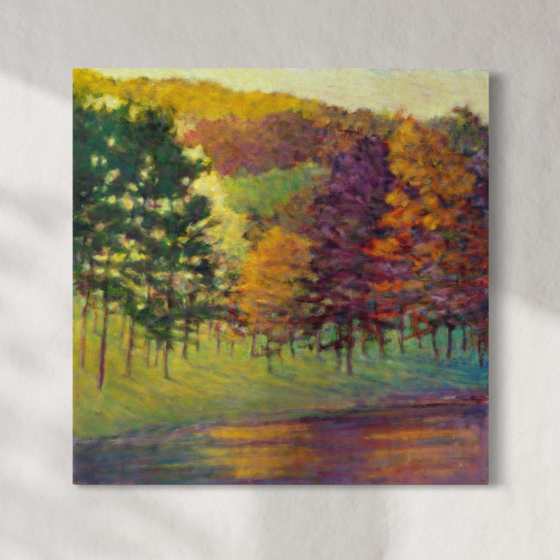 Colorful painting of a forest scene with trees in various autumn colors on a gray background.