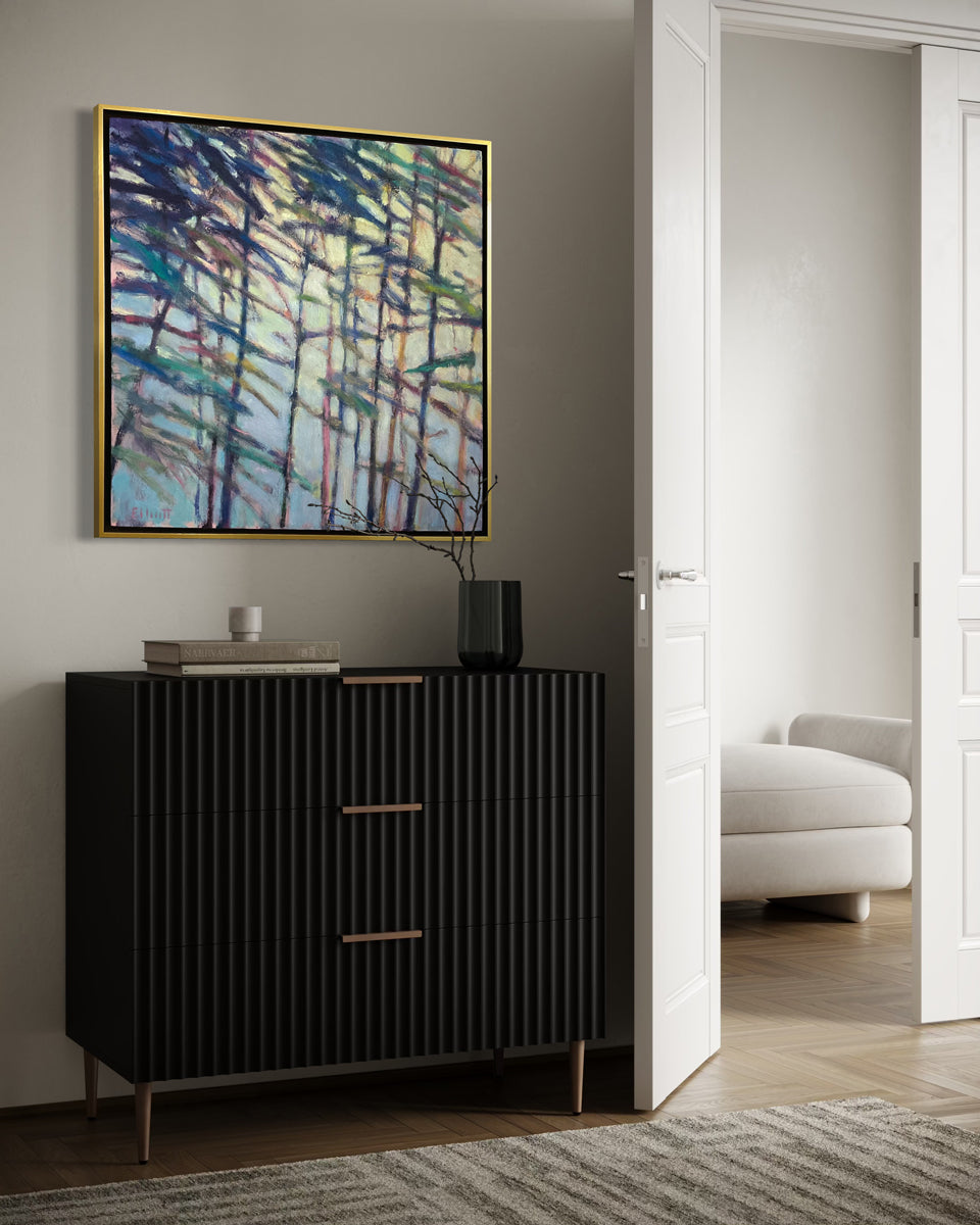 Modern interior with a black cabinet, abstract painting, and white sofa.