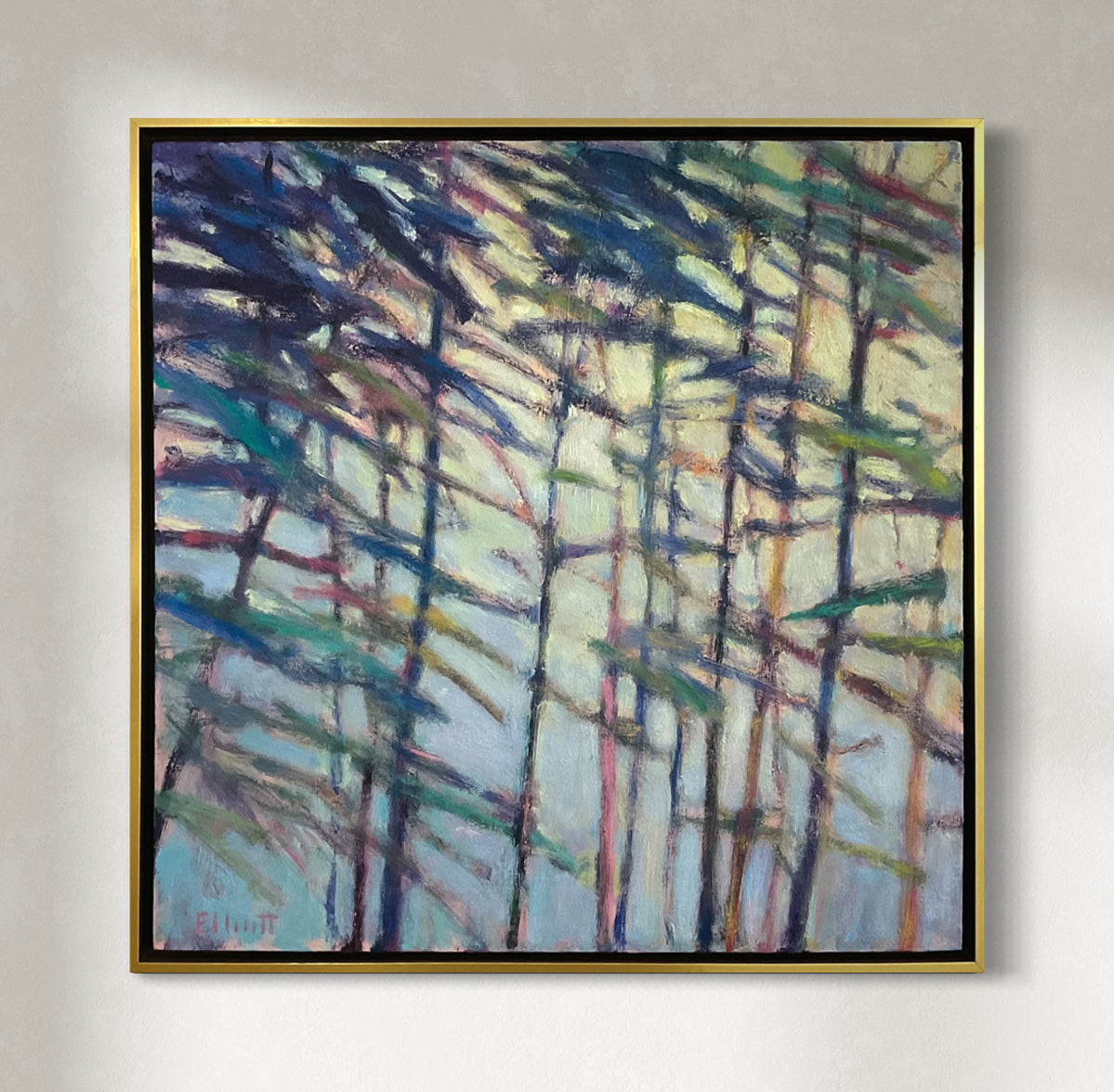 Abstract painting with colorful brush strokes on a gray wall