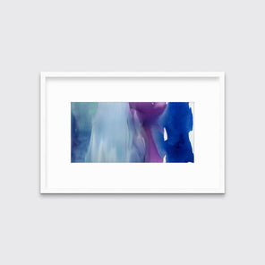 A blue, purple and white abstract print in a white frame with a mat hangs on a white wall.