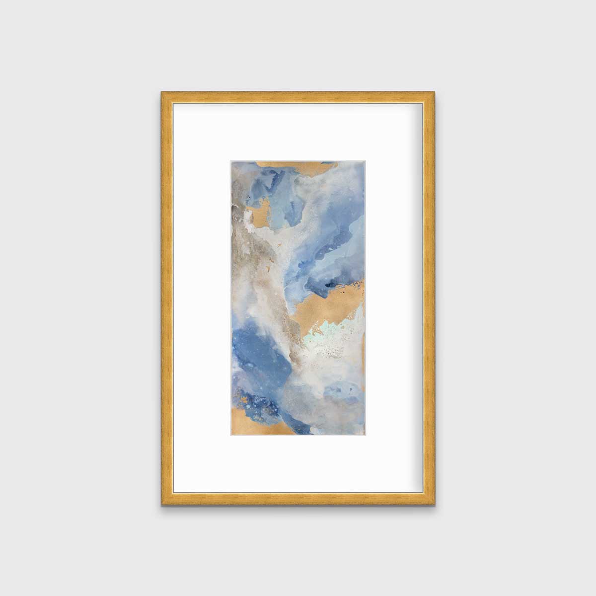A blue, teal, beige and gold abstract print in a gold frame with a mat hangs on a white wall.