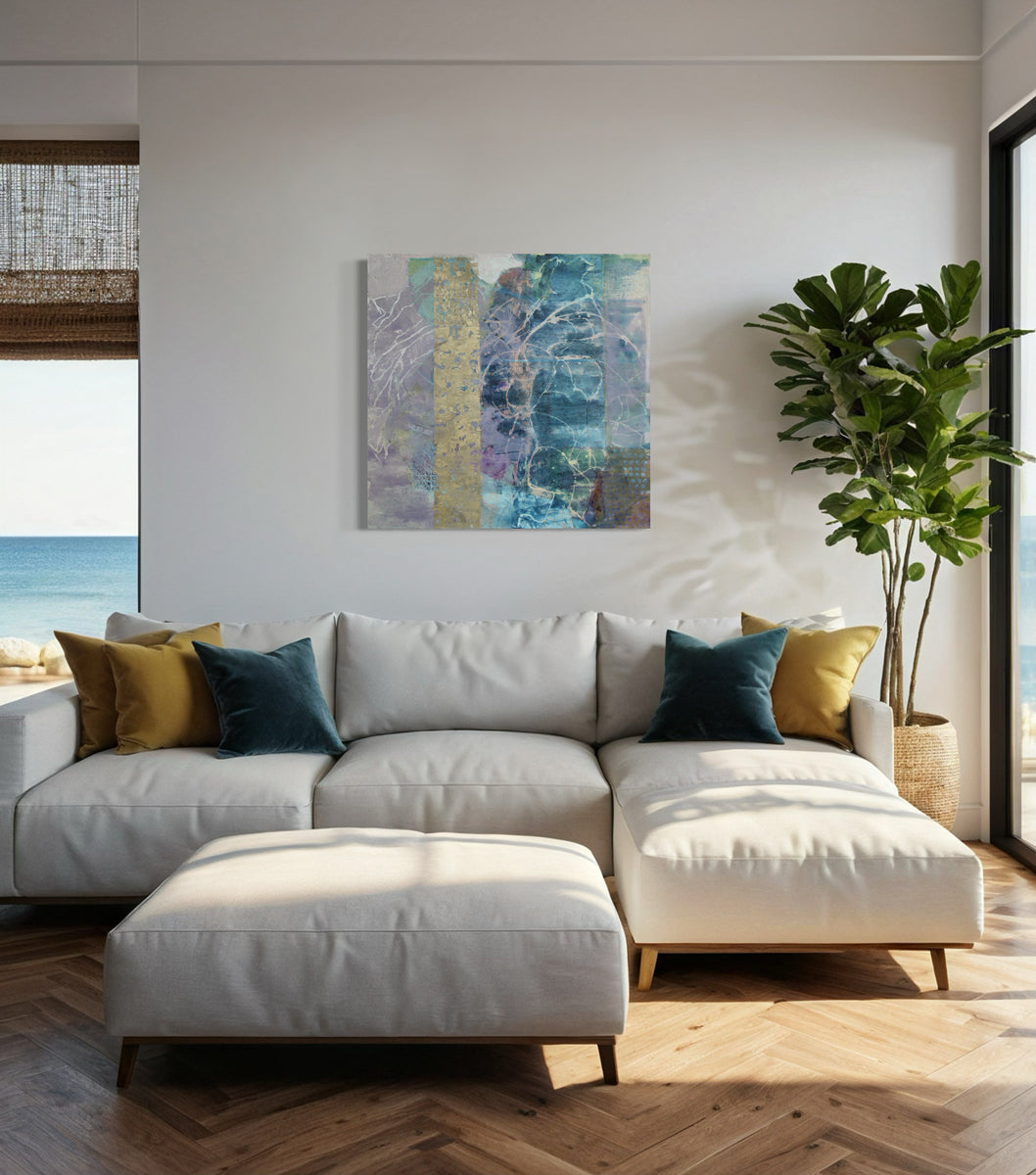 An abstract painting with turquoise, purple, and golden tones is hung above a sofa in a living room.