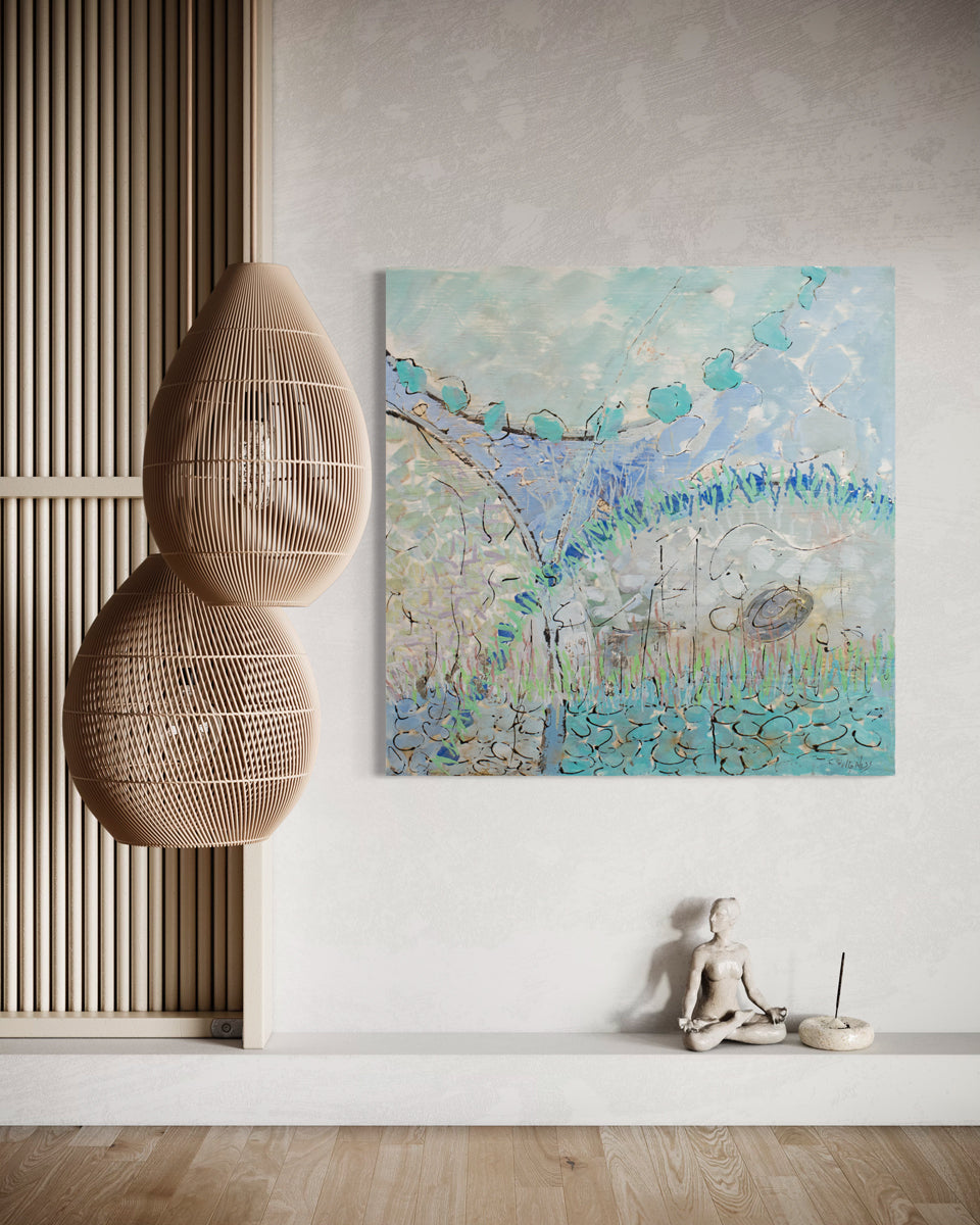 An abstract blue and turquoise painting hangs on a grey wall next to wicker hanging light fixtures and above a yoga sculpture.