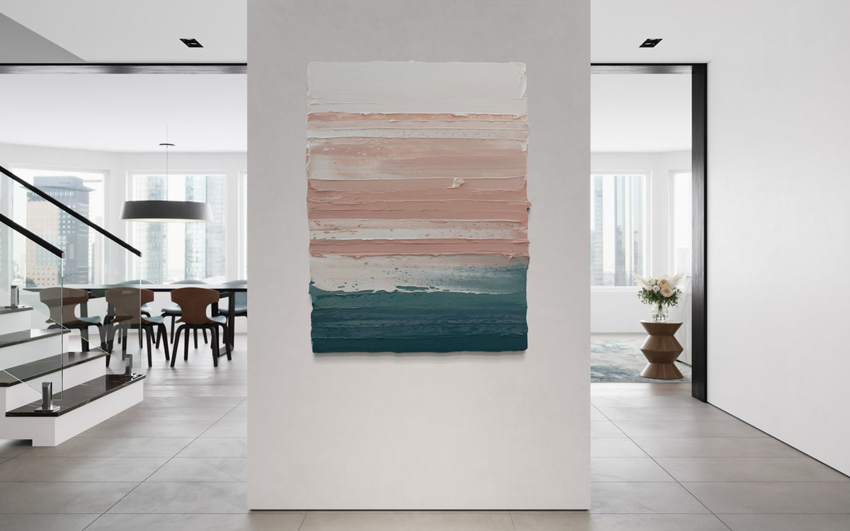 Abstract art piece on a white wall in a modern interior setting