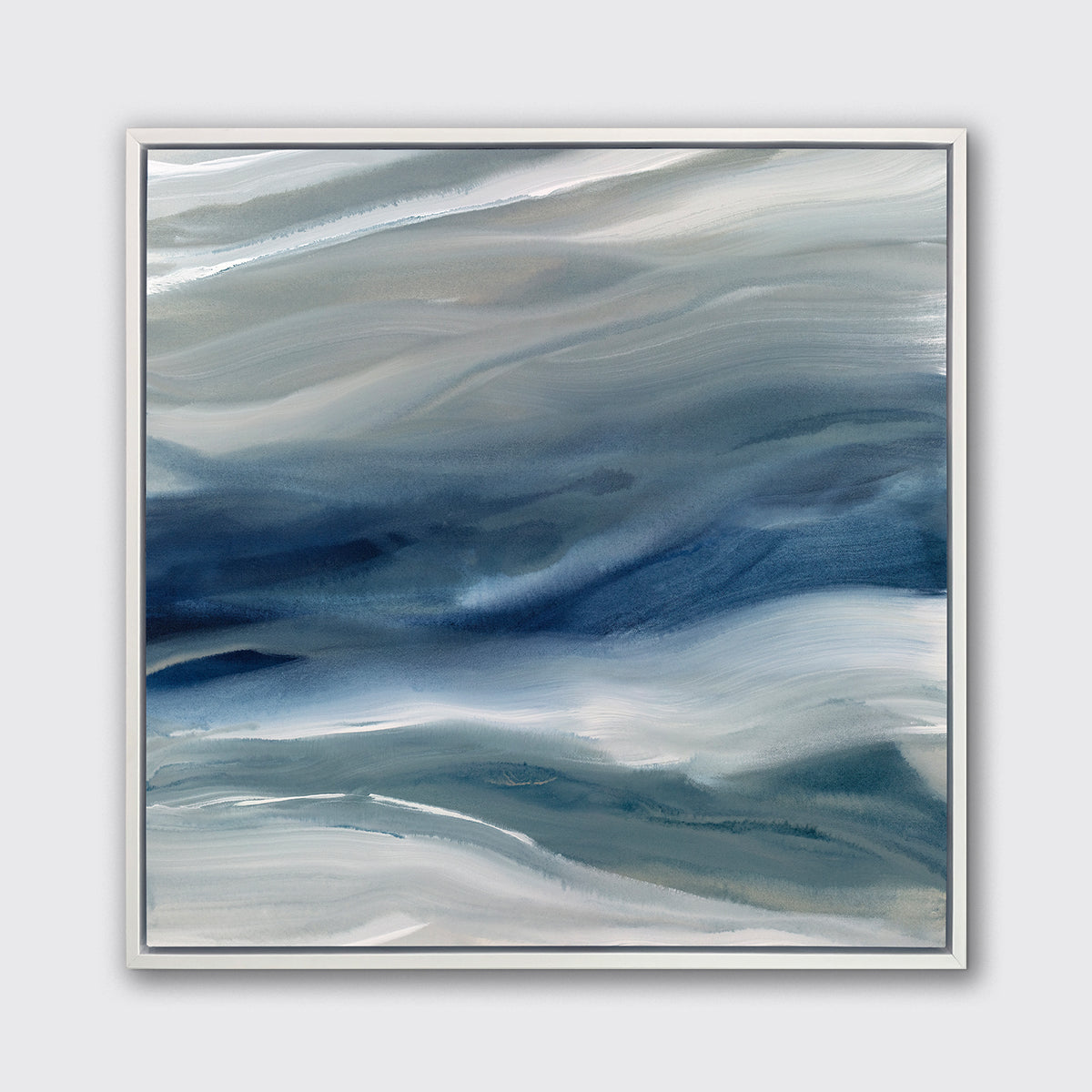 A blue, teal, beige and white abstract print in a white floater frame hangs on a white wall.