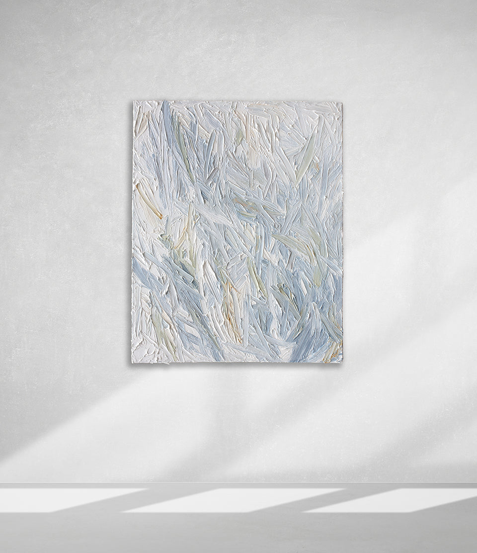 An abstract painting with thickly textured blueish, orangish and greenish beige brushstrokes is hung on a gallery wall.