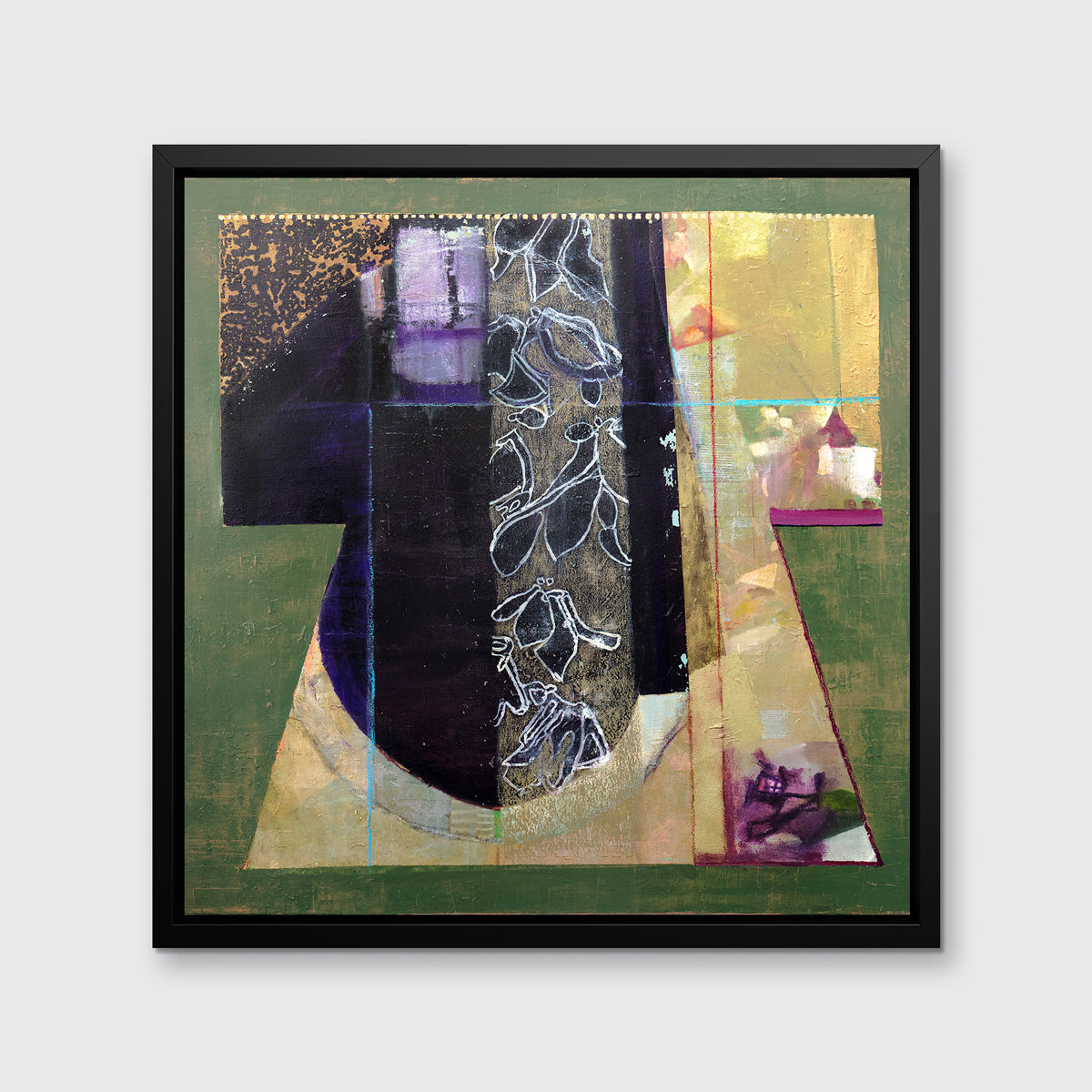 A green, gold and black abstract print in a black floater frame hangs on a white wall.