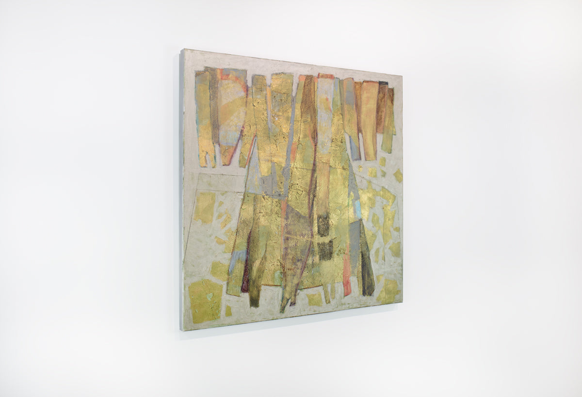 A metallic abstract painting hangs on a white wall.