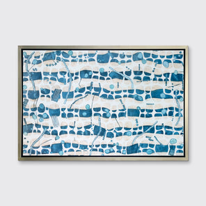 A blue, teal and beige geometric abstract print in a silver floater frame hangs on a white wall.