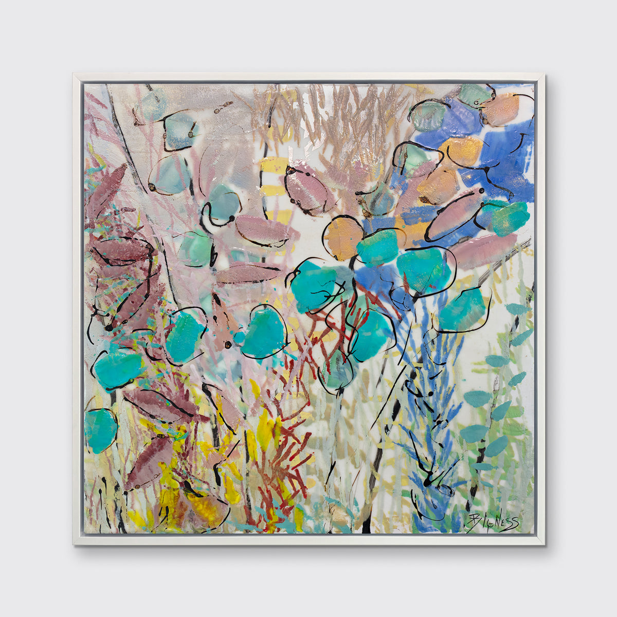 A blue, pink and yellow abstract floral print in a white floater frame hangs on a white wall.
