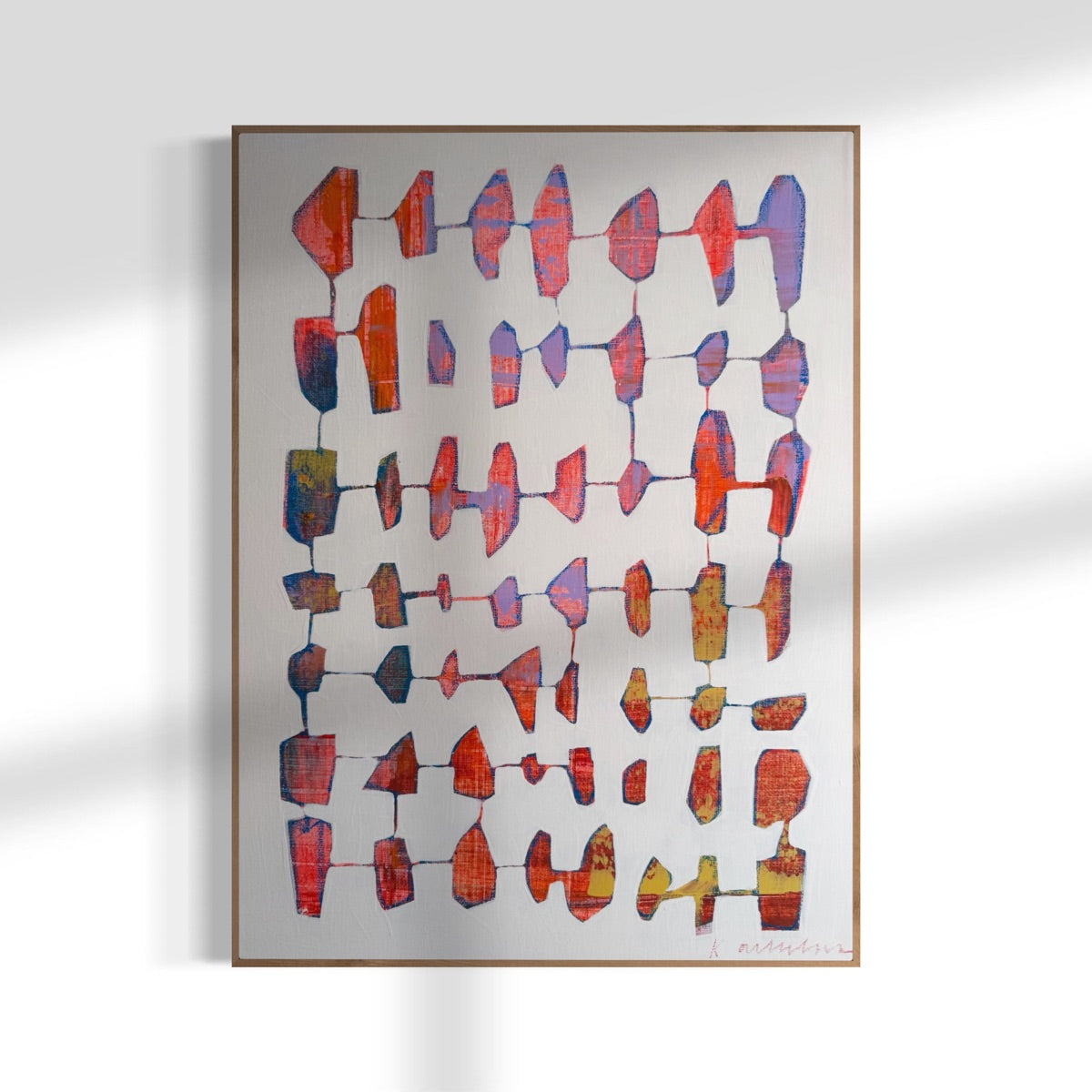 Abstract art print with geometric shapes in red, blue, and green on a white background.