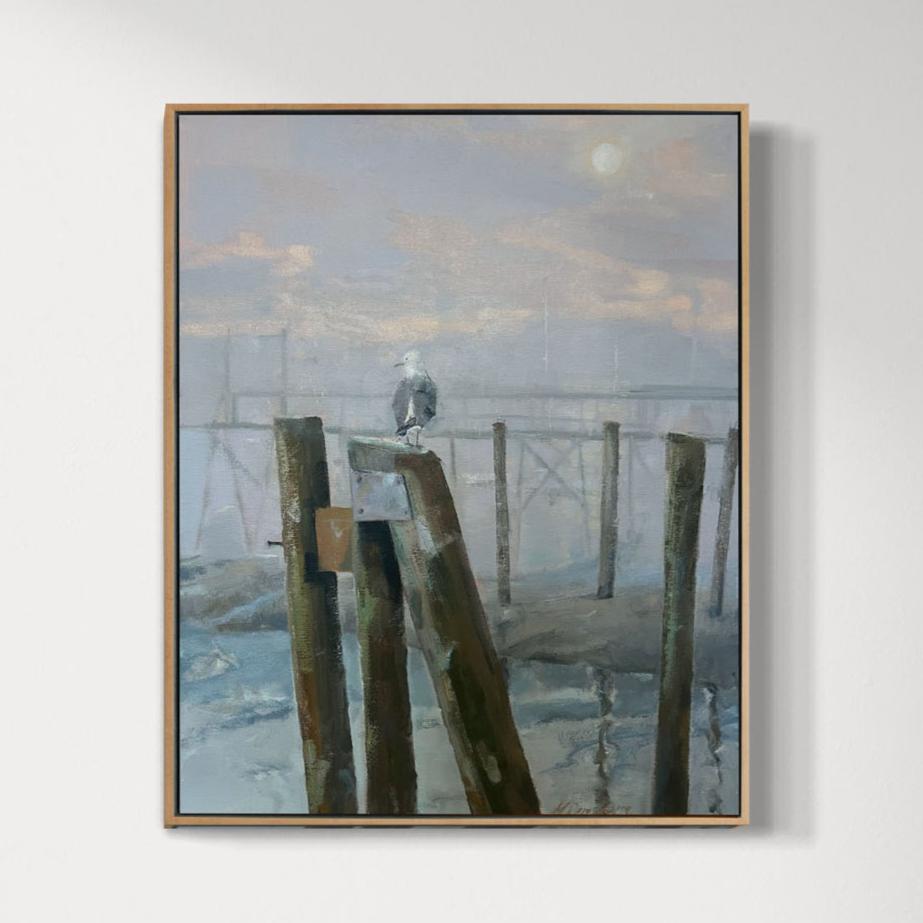 A landscape painting featuring a bird perched on a post with a moonlit sky in the background, framed in a light-colored frame.