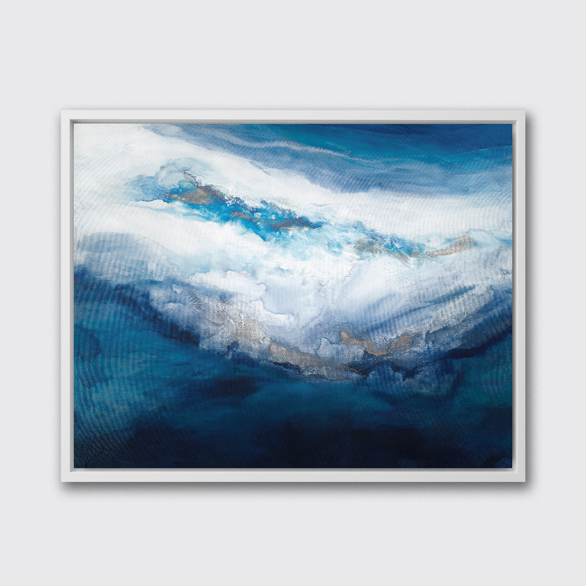 A blue, white, gold and teal abstract print in a white floater frame hangs on a white wall.
