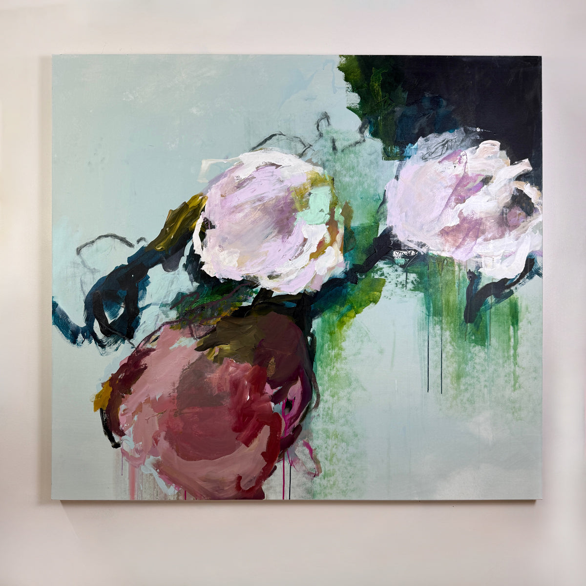 Abstract painting of flowers on a light blue background