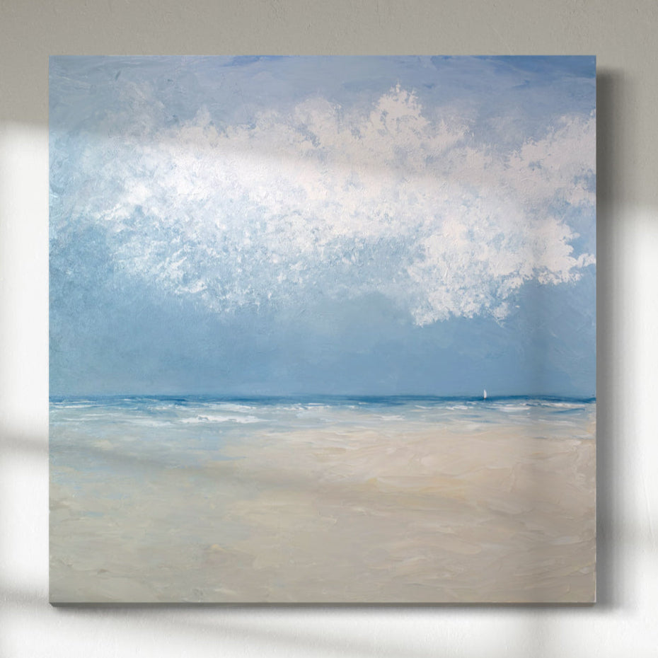 An abstract seascape painting hangs on a white wall.