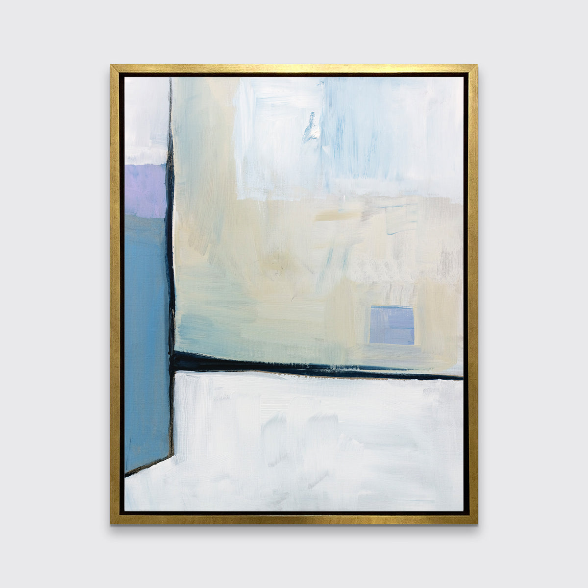 A white, black, blue and chartreuse abstract print in a gold floater frame hangs on a white wall.