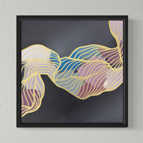Framed abstract artwork with colorful wavy lines on a gray wall.