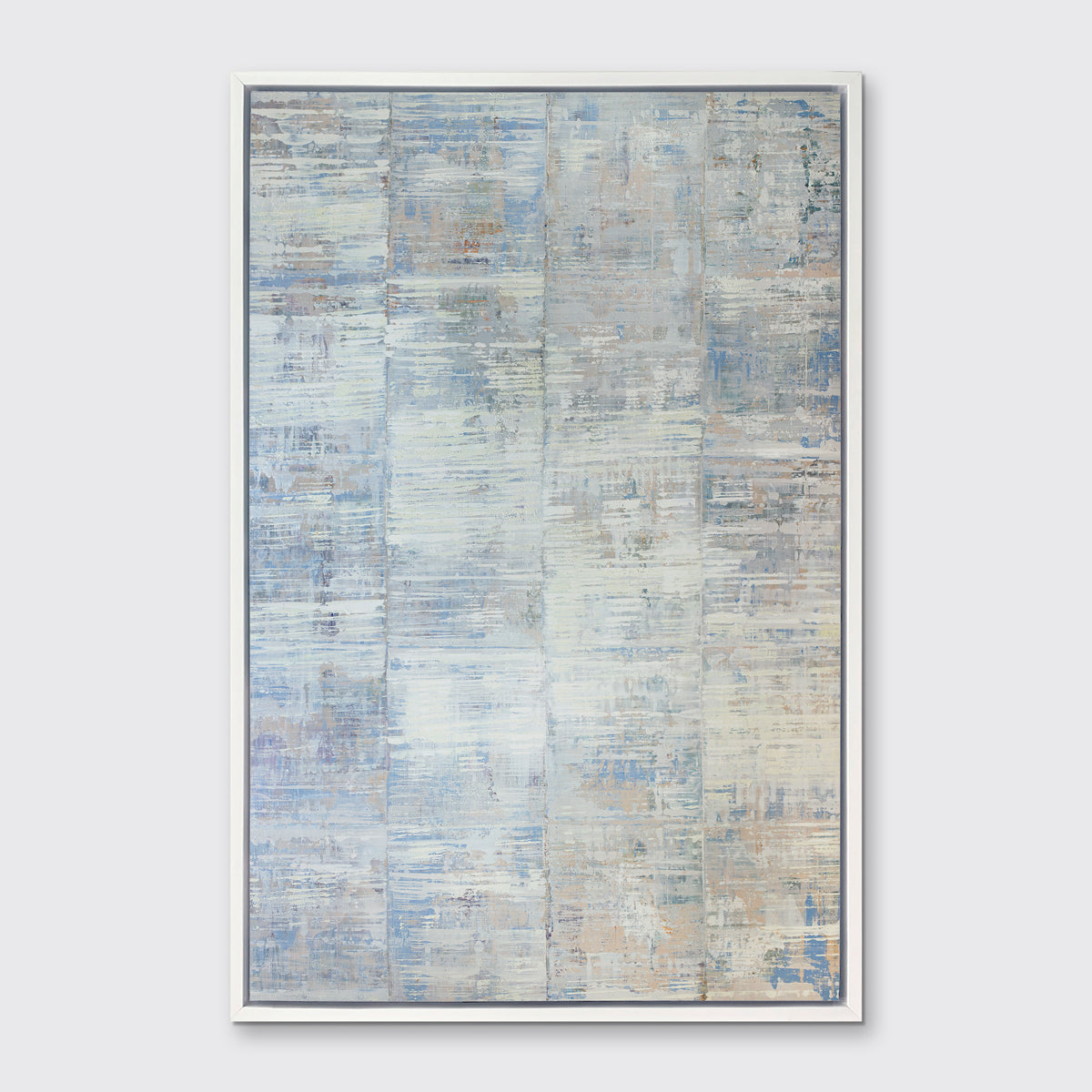A white and blue abstract print in a white floater frame hangs on a white wall.
