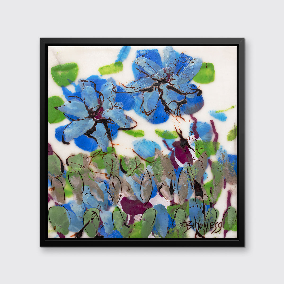 A blue, green and white abstract floral print in a black floater frame hangs on a white wall.