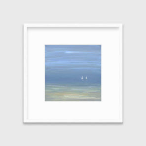 A blue, beige and white abstract seascape print with two small sailboats in a white frame with a mat hangs on a white wall.