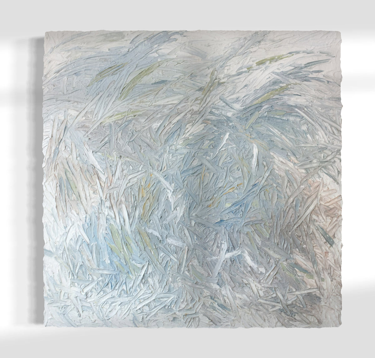 Original abstract painting with thick texture by artist Teodora 'Teo' Guererra hanging on a white wall.