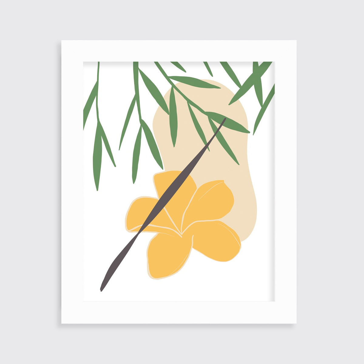 A green and yellow abstract botanical art print framed in an unmatted white frame hangs on a light wall.