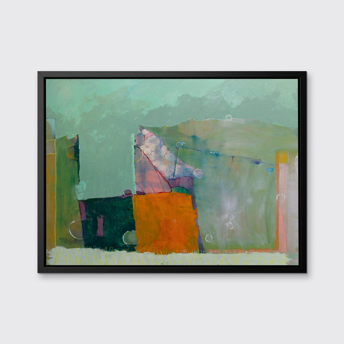 A teal, orange and green abstract print in a black floater frame hangs on a white wall.