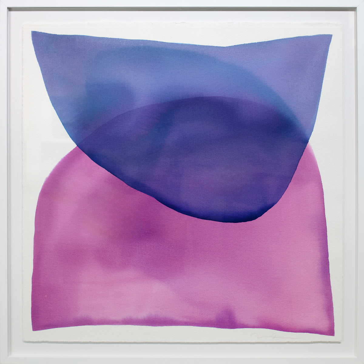 A blue and magenta minimalist abstract watercolor painting framed in a white box frame.