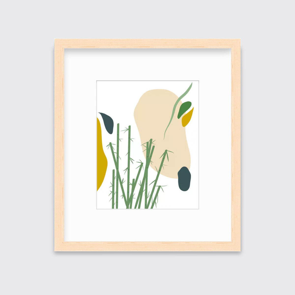 An abstract yellow, beige, blue, and green botanical art print framed in a neutral wood frame hangs on a light wall.