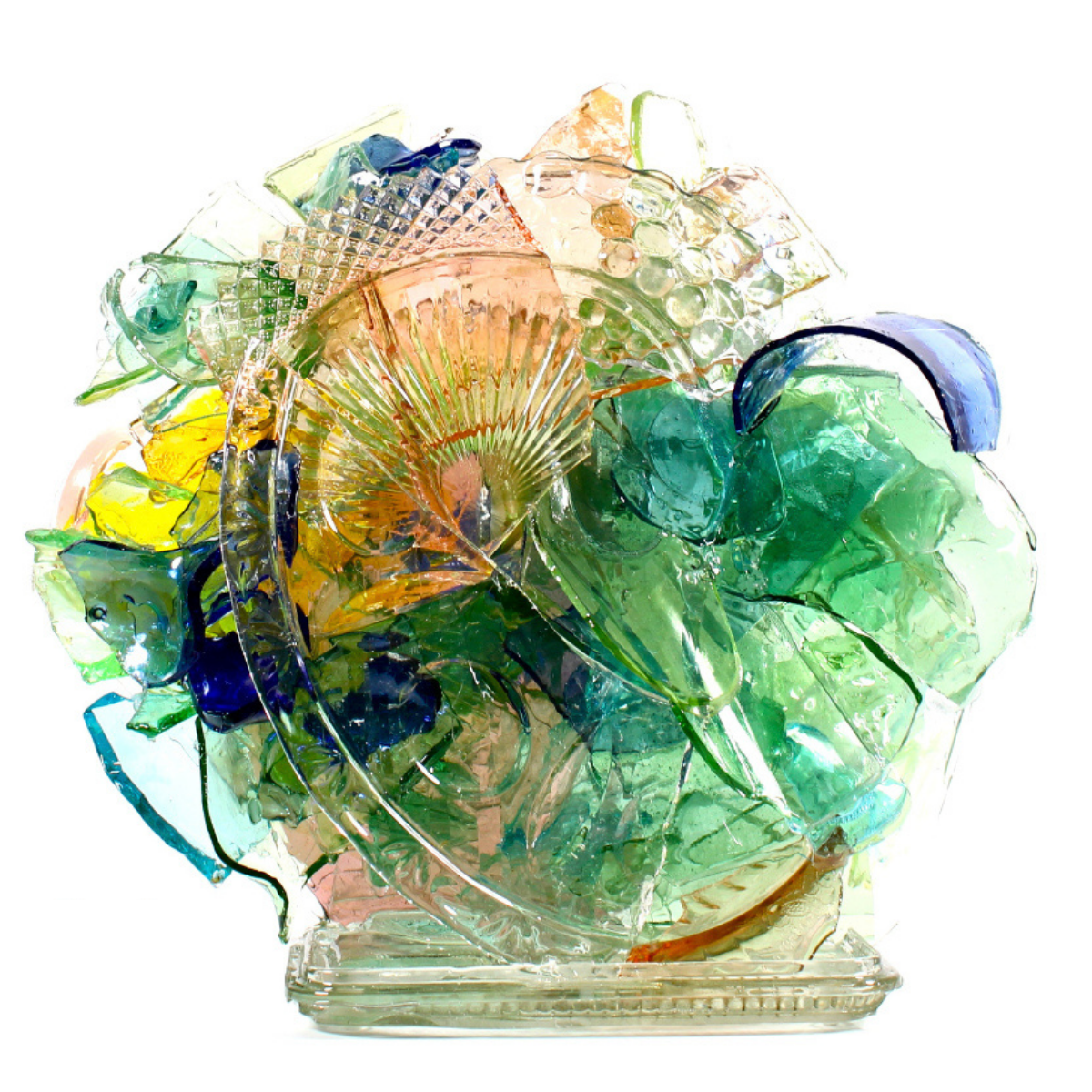 Colorful glass sculpture with various shapes and colors on a white background.