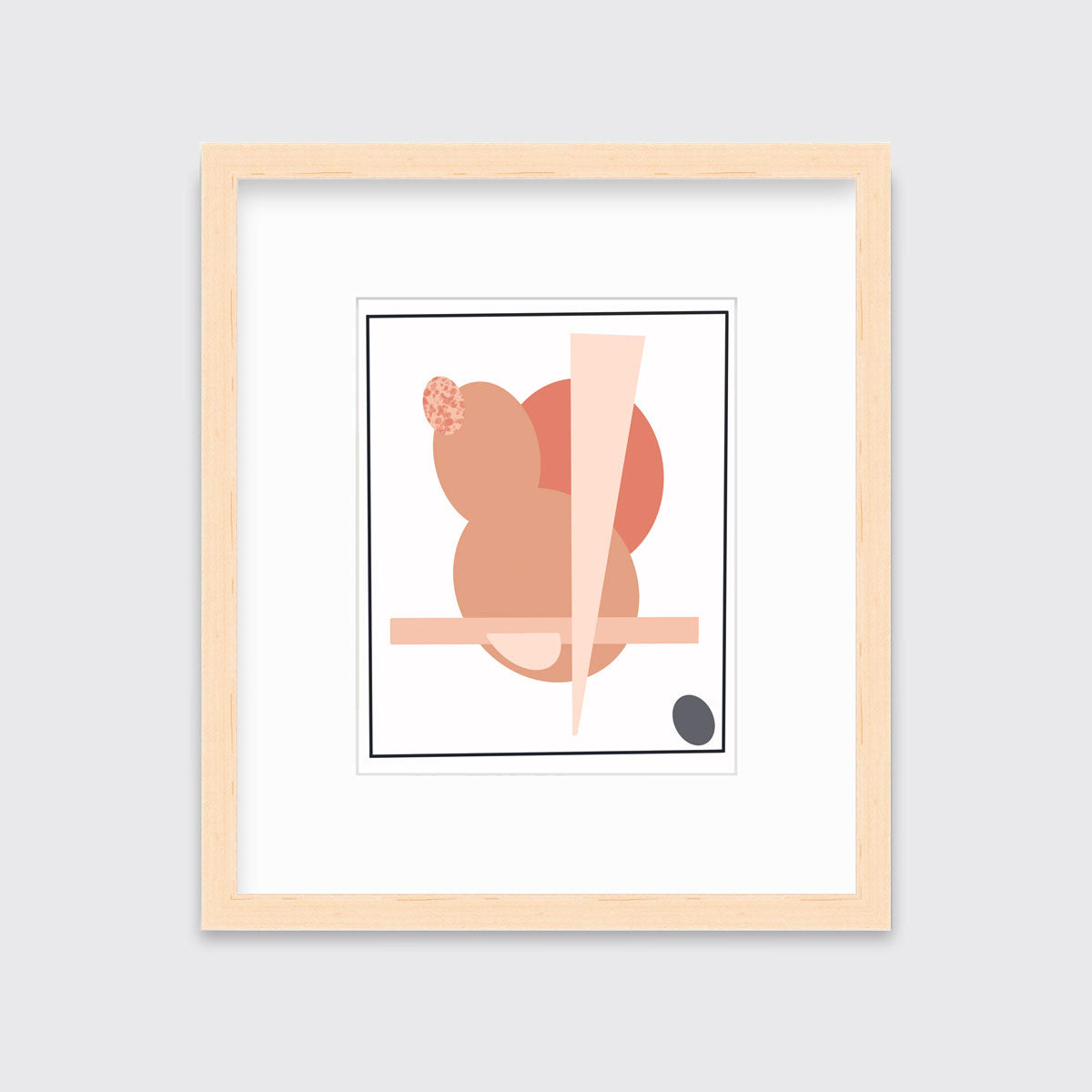 A pink and grey abstract art print framed in a neutral wood frame hangs on light wall.