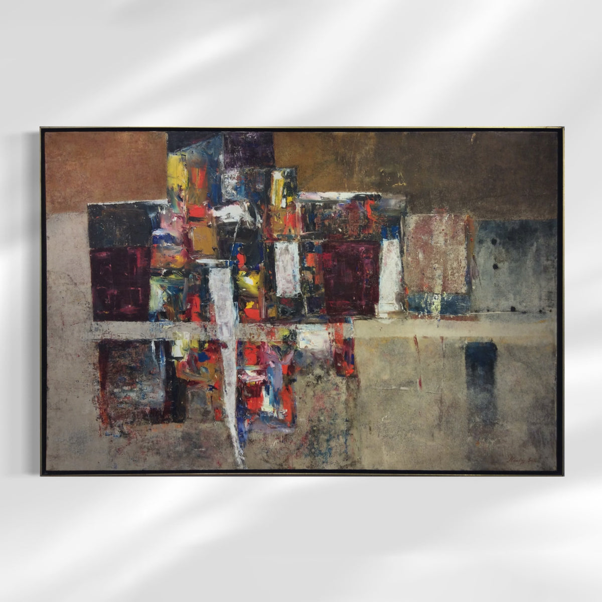 A modern painting by modern artist Stanley Bate is hung on a white wall.