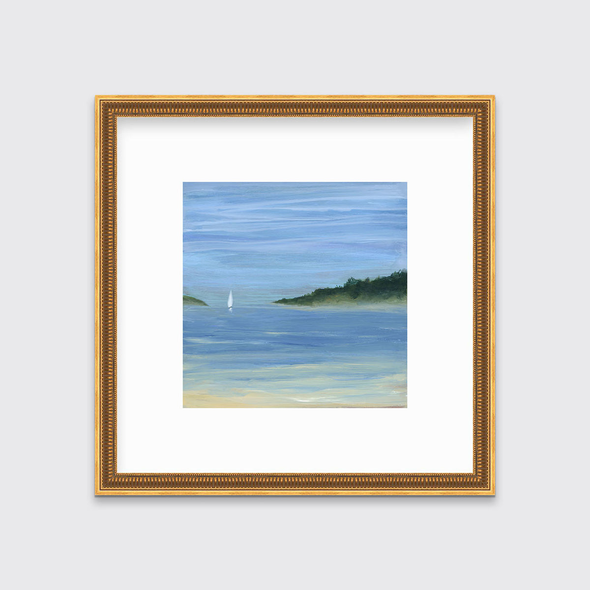 A blue, green and white abstract seascape print with a small sailboat in a gold fluted frame with a mat hangs on a white wall.
