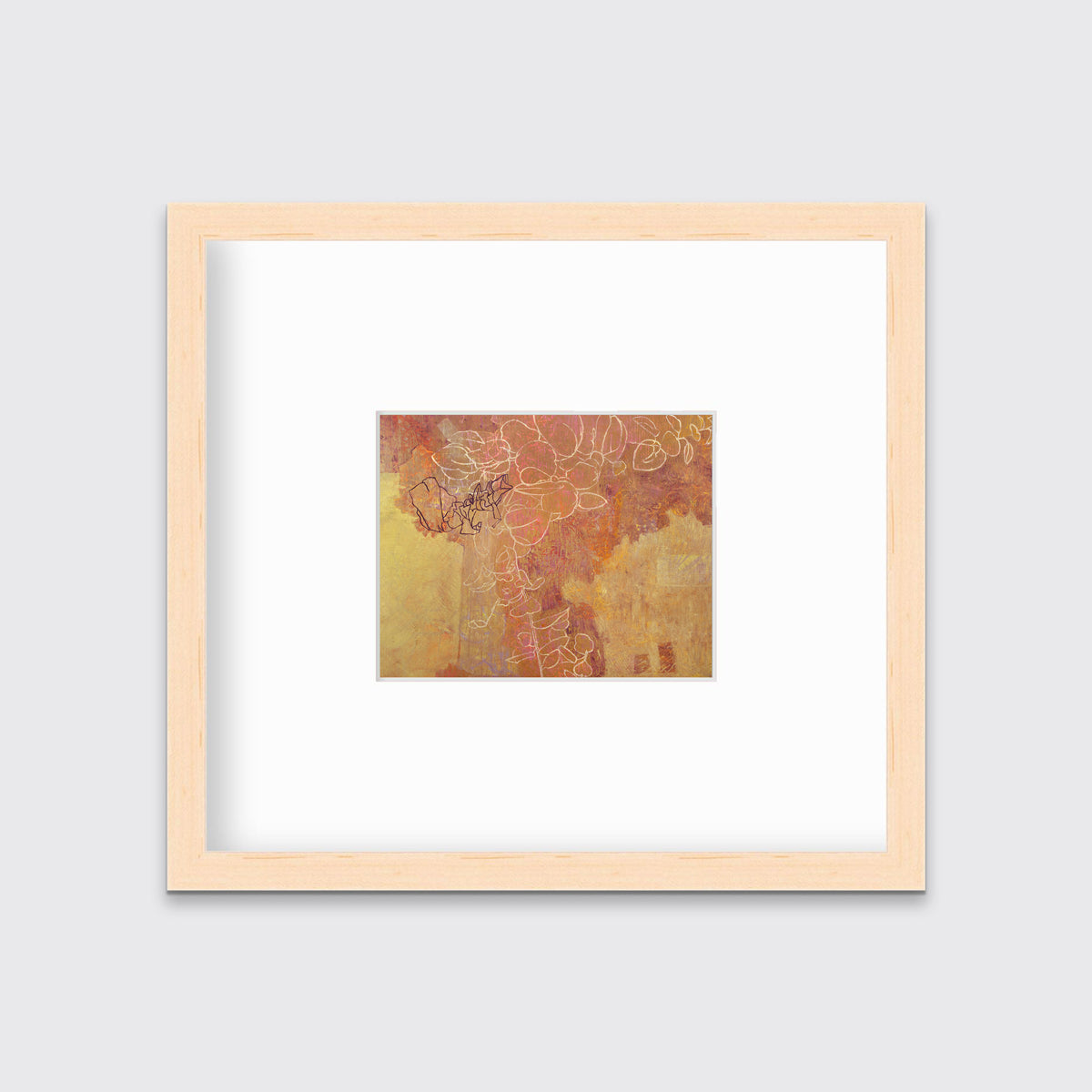 A gold, purple and white abstract print in a natural wood frame with a mat hangs on a white wall.