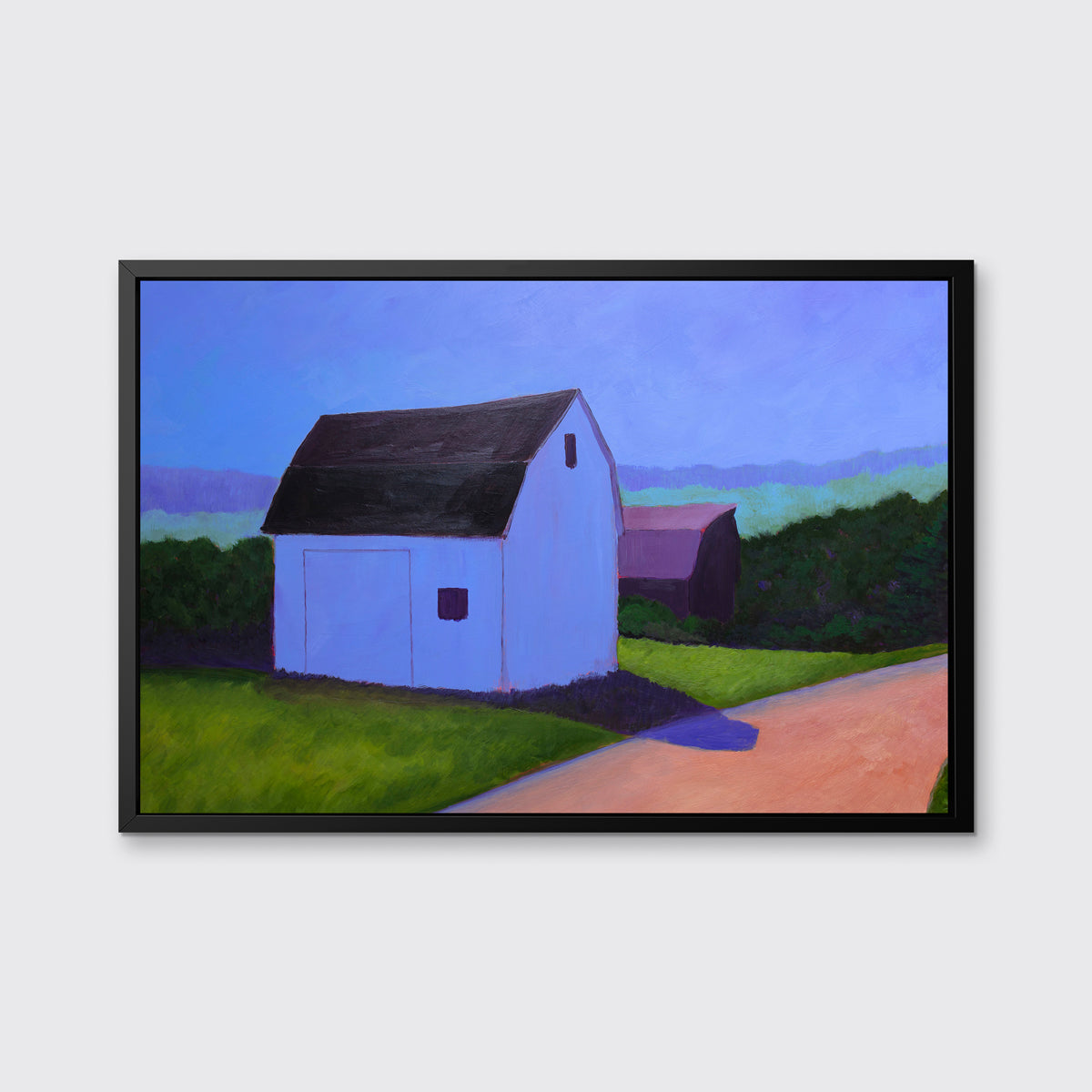 A blue, green and peach contemporary barn print in black floater frame hangs on a white wall.