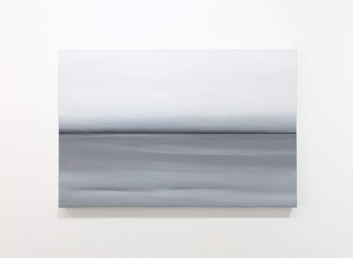 A grey oil painting with a single black line in the middle of the painting that suggests a horizon line is hung on a gallery wall. Wired and ready to hang.