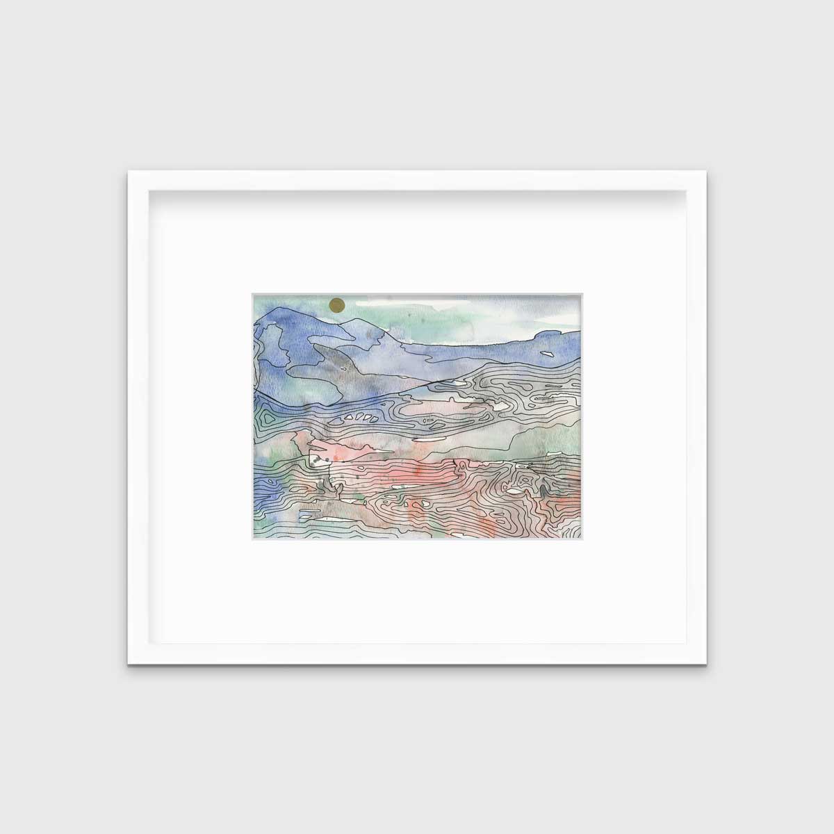 A blue, green and red abstract landscape print in a white frame with a mat hangs on a white wall.