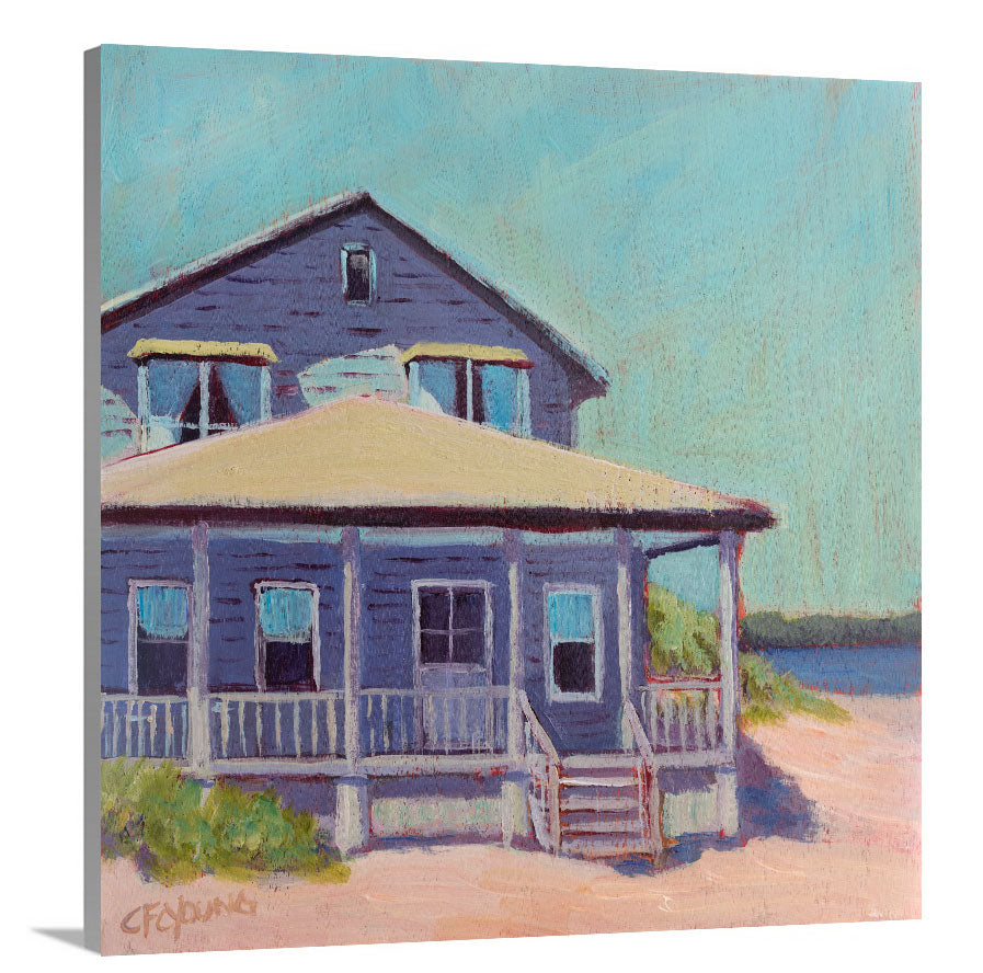 A side-angle view of a teal, purple, beige and rose contemporary beach house print on canvas.