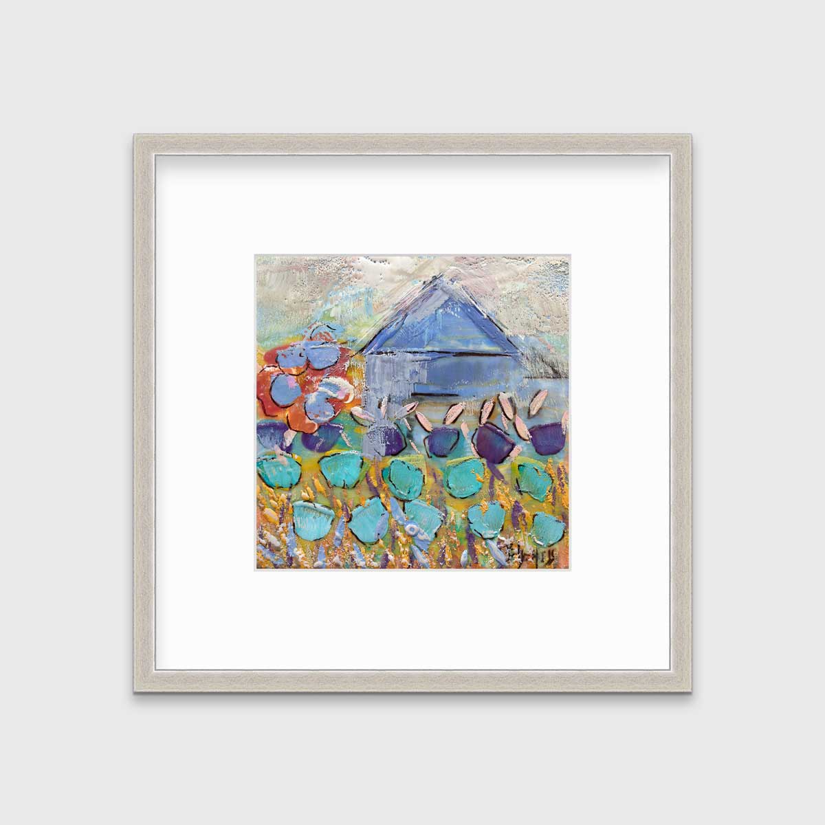 A teal, green and white abstract floral print in a silver frame with a mat hangs on a white wall.
