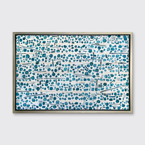 A dark teal, white and beige abstract print in a silver floater frame hangs on a white wall.