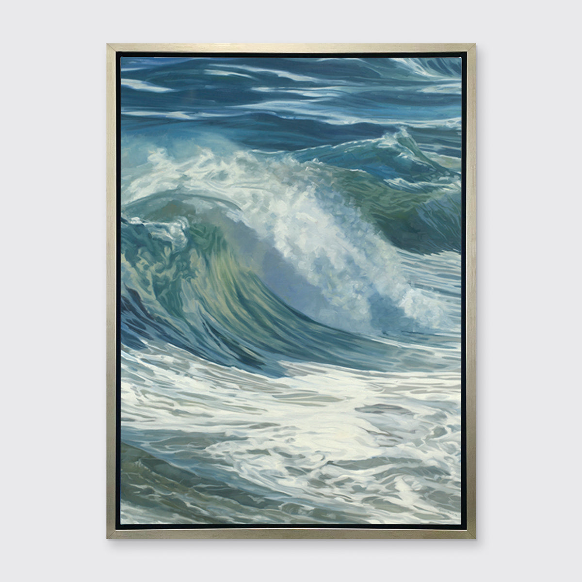 A blue, teal, white and light green abstract water wave print in a silver floater frame hangs on a white wall.