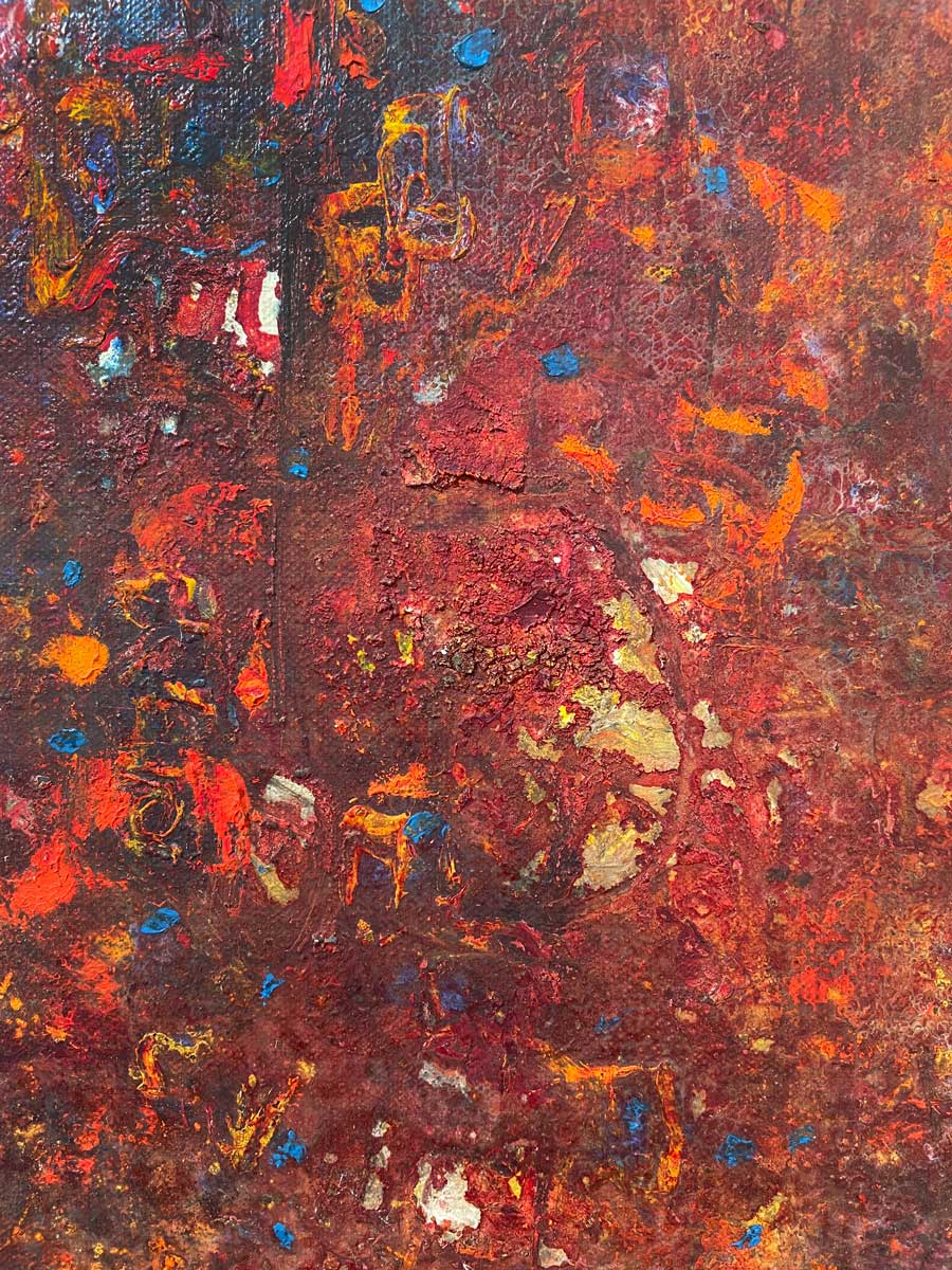 An up close image of red, orange, blue and brown.
