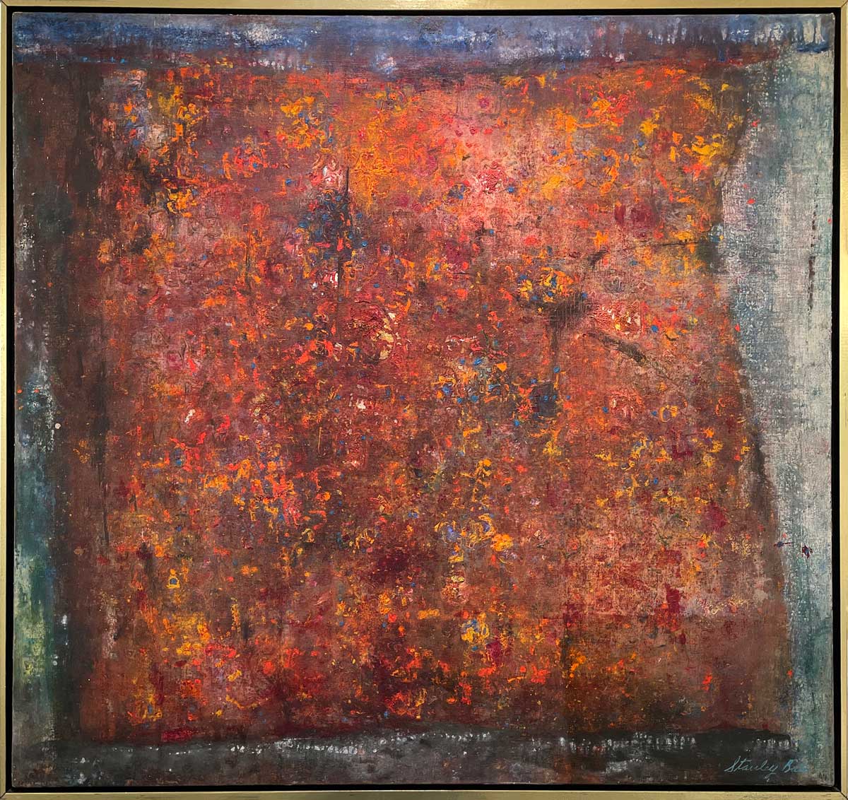 A red, orange and grey abstract painting in a gold floater frame.