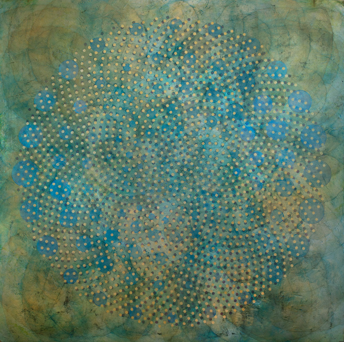 green and yellow layered circles under blue and gold smaller circles