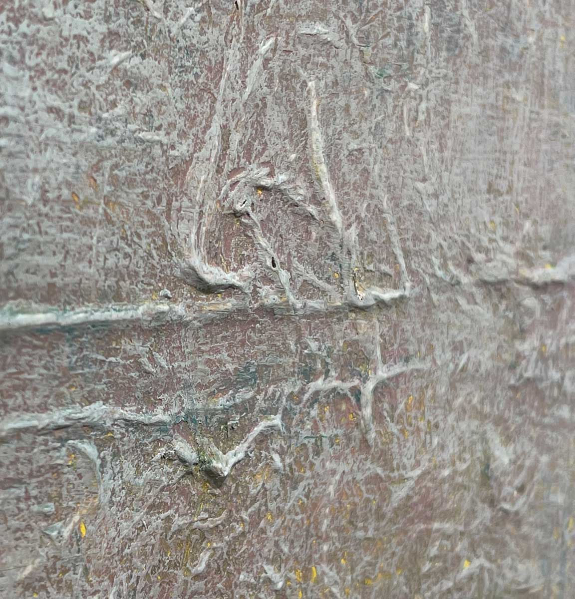 An up close detail of the texture of the paint on canvas.