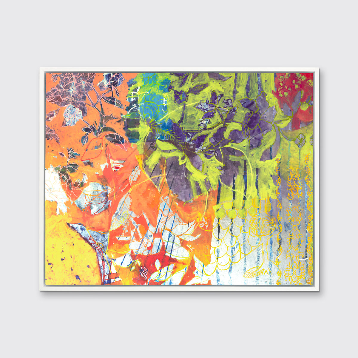 A multicolored abstract print in a white floater frame hangs on a white wall.