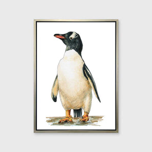 A penguin print in a silver floater frame hangs on a white wall.